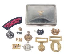 COLLECTION OF BRITISH ROYAL MARINES BADGES WITH GERMAN INSPIRED CASE