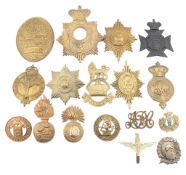 A COLLECTION OF EDWARDIAN/ VICTORIAN MILITARY CAP BADGES