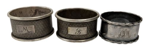 THREE 20TH CENTURY GEORGE V HALLMARKED SILVER NAPKIN RINGS