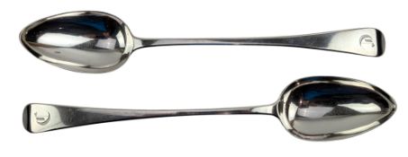 TWO EARLY 19TH CENTURY GEORGE III HALLMARKED SILVER SERVING SPOONS