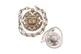 A SILVER AZTEC CALENDAR PENDANT & CHAIN WITH ANOTHER