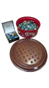 EARLY 20TH CENTURY WOODEN SOLITAIRE BOARD W/ LARGE COLLECTION OF MARBLES