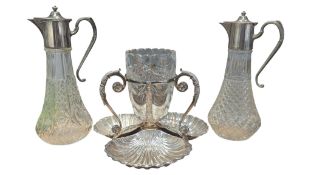 TWO EARLY 20TH CENTURY SILVER PLATED CLARET JUGS W/ A TREFOIL PLATED DISH