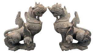 A PAIR OF 19TH CENTURY BURMESE CARVED WOODEN FOO TEMPLE GUARDIAN CHINTHE DOGS