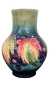 WILLIAM MOORCROFT (1872-1945) LEAF AND BERRY PATTERN VASE