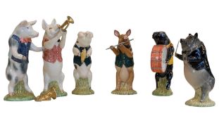 BESWICK, ENGLAND - A COLLECTION OF VINTAGE 20TH CENTURY PORCELAIN PIG BAND FIGURES
