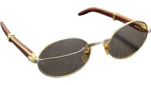 CARTIER, FRANCE - LATE 20TH CENTURY PAIR OF SUNGLASSES