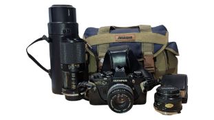 OLYMPUS OM10 SLR FILM CAMERA WITH LENSES, FLASH AND CARRY BAG