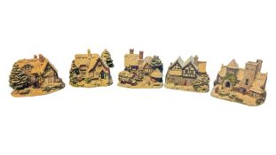 LILLIPUT LANE - FIVE UNBOXED LATE 20TH / 21ST CENTURY RESIN CHRISTMAS COTTAGE FIGURES