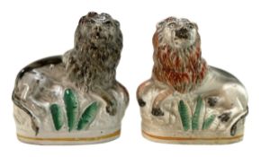 NEAR PAIR OF MID 19TH CENTURY STAFFORDSHIRE FIGURES OF LIONS