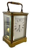 EARLY 20TH CENTURY BRASS CARRIAGE CLOCK WITH ENAMEL DIAL