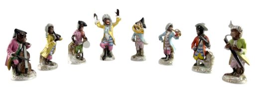 CAPODIMONTE - A GROUP OF EIGHT MONKEY BAND STYLE FIGURES