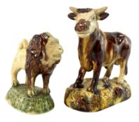 TWO EARLY STAFFORDSHIRE, POSSIBLY WHIELDON, MAJOLICA GLAZED COW/BULL AND LION