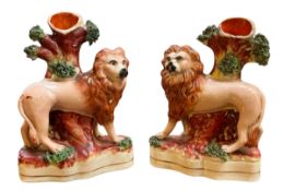 PAIR OF MID 19TH CENTURY STAFFORDSHIRE HAND PAINTED LION & TREE SPILL VASES