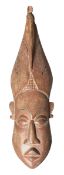 WEST AFRICAN, YORUBA PEOPLE CARVED WOOD MASK OF BELIEVED ESHU
