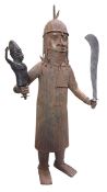 LARGE FLOOR BENIN INSPIRED BRONZE STATUE OF A WARRIOR WITH MACHETE & DOLL