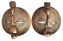 PAIR OF IMPRESSIVE WEST AFRICAN INSPIRED CARVED & OVERLAID MOON MASKS