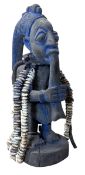 NIGERIAN, YORUBA PEOPLE CARVED WOOD & BLUE PAINTED ESHU SHRINE FIGURE WITH SHELLS