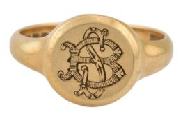A HALLMARKED 18CT GOLD SIGNET RING