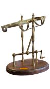 20TH CENTURY VINTAGE BRASS MECHANICAL WINE DECANTING CRADLE