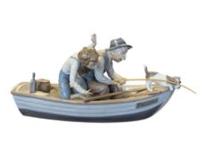 LLADRO - LATE 20TH CENTURY PORCELAIN FISHING WITH GRAMPS FIGURE 5215