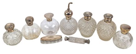 SEVEN 20TH CENTURY HALLMARKED SILVER & GLASS TOPPED SCENT BOTTLES & A TRINKET BOX