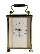 DOMINION - AN EARLY 20TH CENTURY BRASS CASED CARRIAGE CLOCK