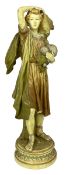 LARGE 20TH CENTURY ROYAL DUX FIGURINE OF MAN CARRYING A BASKET & FRUIT