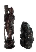 TWO 20TH CENTURY CHINESE FIGURINES INCLUDING A HARDWOOD FIGURE OF A TAOIST IMMORTAL
