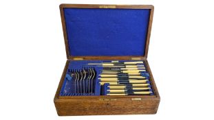 EARLY 20TH CENTURY OAK CASED CANTEEN OF CUTLERY