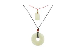 TWO CHINESE JADE PENDANT NECKLACES