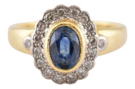 HALLMARKED 18CT GOLD SAPPHIRE & DIAMOND HALO RING