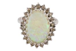 1970S HALLMARKED 18CT GOLD OPAL & DIAMOND HALO RING