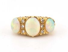 18CT GOLD OPAL & DIAMOND THREE STONE CABOCHON RING