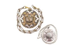 A SILVER AZTEC CALENDAR PENDANT & CHAIN WITH ANOTHER