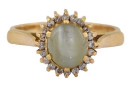 18CT GOLD CAT'S EYE CHRYSOBERYL & DIAMOND HALO RING