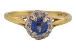 18CT GOLD SAPPHIRE & DIAMOND HALO RING