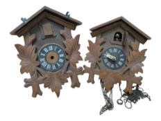 TWO 20TH CENTURY WEST GERMAN BLACK FOREST STYLE WOODEN CUCKOO CLOCKS