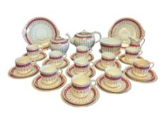 19TH CENTURY GILT & MAGENTA PORCELAIN TEA SERVICE