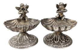 PAIR OF 925 SILVER TABLE SALTS IN THE FORM OF A SHELL ON STAND
