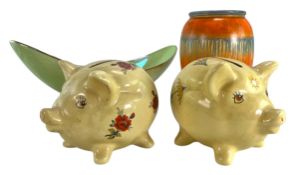 A PAIR OF 20TH CENTURY SINGLE USE WADE PIGGY BANKS WITH ANOTHER