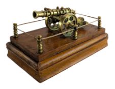 EARLY 20TH CENTURY WOODEN & BRASS DESK CANNON
