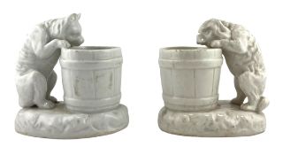 A LATE 20TH CENTURY PAIR OF STAFFORDSHIRE-STYLE WHITE GLAZED MATCH HOLDERS