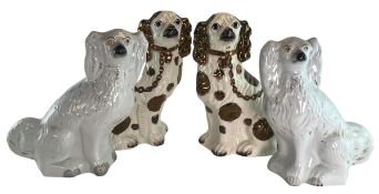 TWO PAIRS OF 20TH CENTURY STAFFORDSHIRE STYLE MANTEL SPANIEL DOGS