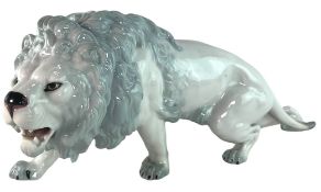 EARLY 20TH CENTURY PORCELAIN LION FIGURINE - E. & A. MULLER