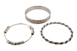 COLLECTION OF THREE WHITE METAL & SILVER BANGLES