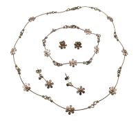 SUITE OF SILVER DAISY MOTIF JEWELLERY