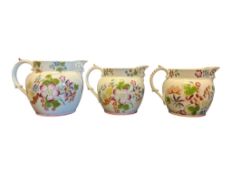 19TH CENTURY VICTORIAN CHINA HAND PAINTED GRADUATING JUG SET