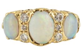 HALLMARKED 18CT GOLD THREE STONE OPAL CABOCHON RING