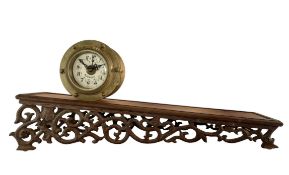 10 JEWEL 'ROLLING DRUM' CLOCK ON CARVED WOODEN STAND